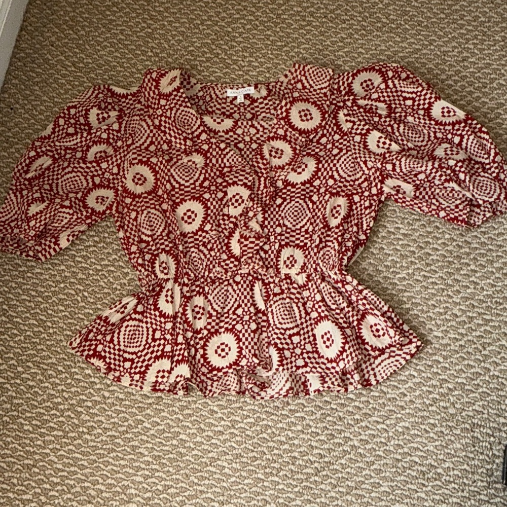 Anna Cate Ruffle Peplum Blouse . Excellent condition . Small . Orange and Cream